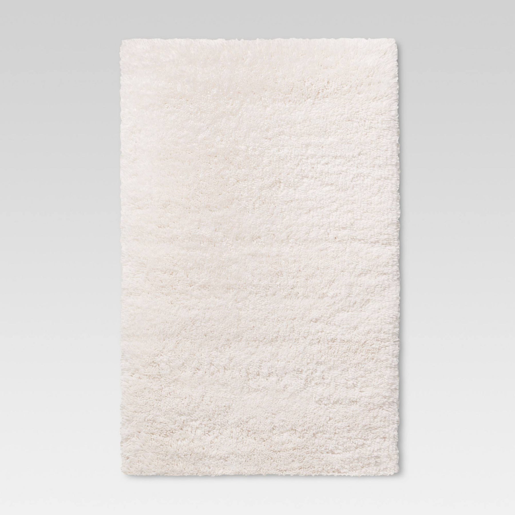 4'x5'6" Cream Plush Shag Washable Accent Rug - Room Essentials - Product image 1